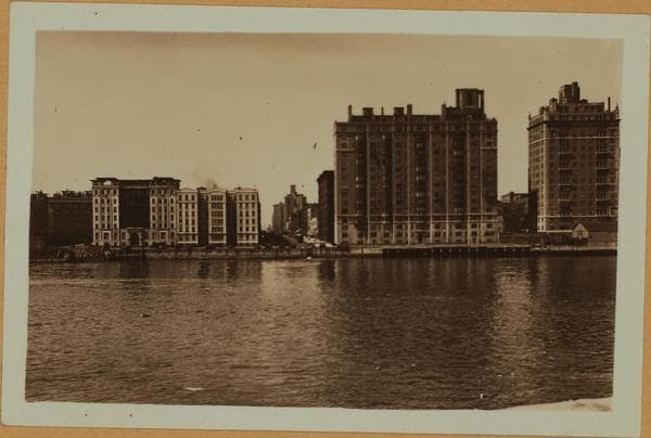 East River - Shore and skyline of Manhattan between East 76th and 80th Streets - Queensborough Bridge - [East End Hotel for Women - Yorkgate.], 1933–1935